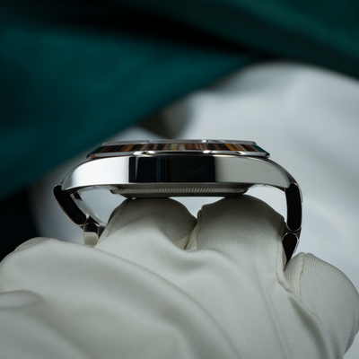 Rolex Air King Automatic Black Dial 126900 side view, showing polished case profile and bracelet.